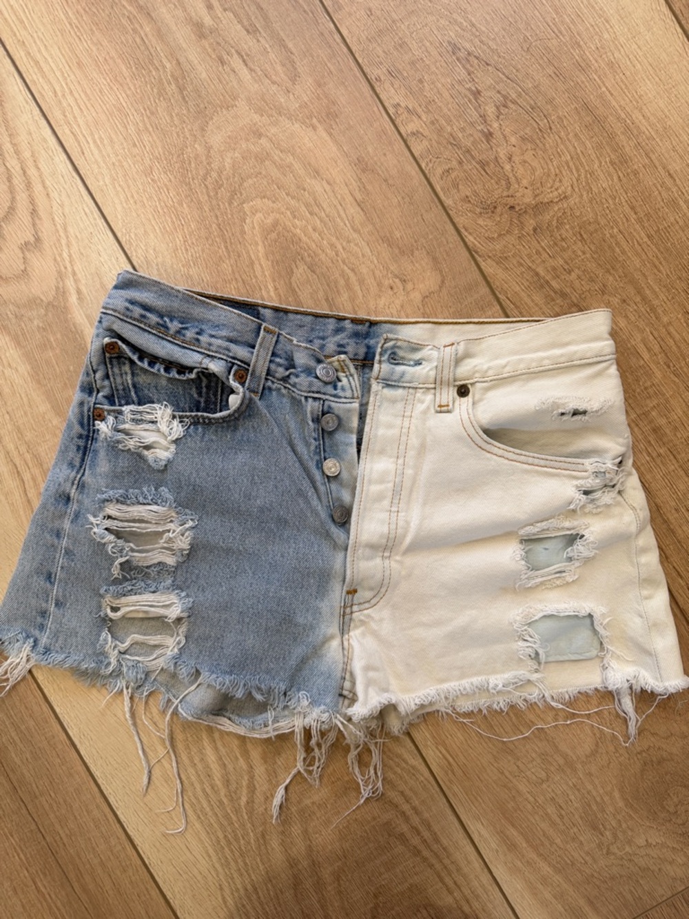 Levi's Two-Tone Distressed Denim Shorts in Blue and White